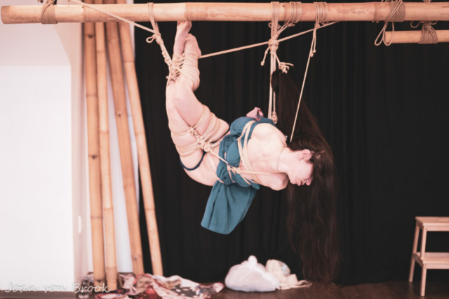 woman tied semenawa traditional japanese rope bondage kinbaku shibari